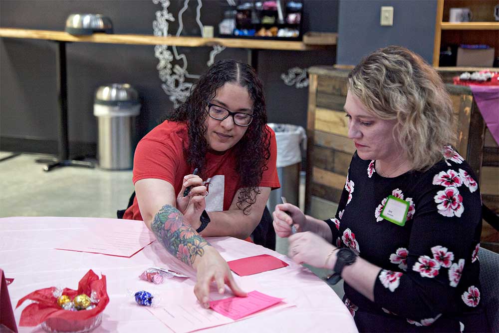 Women at Galentine's Day event Women at Galentine's Day event